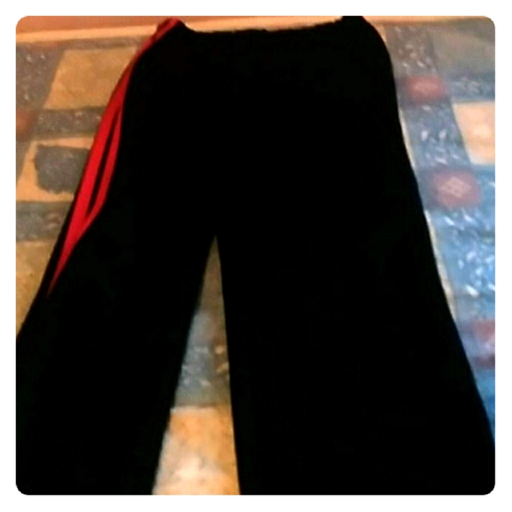black pants with pink lines on the sides